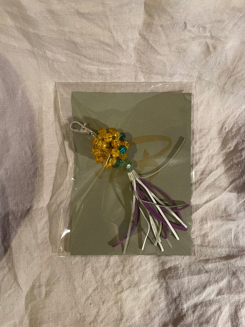 Teija Rusila Art. Reflective bag charm (Celt/turquoise/purple)